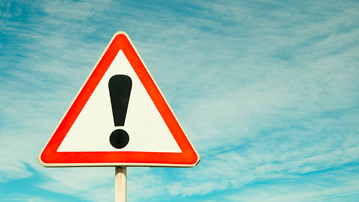 Sign with exclamation point - a warning ahead Sign with exclamation point - a warning ahead